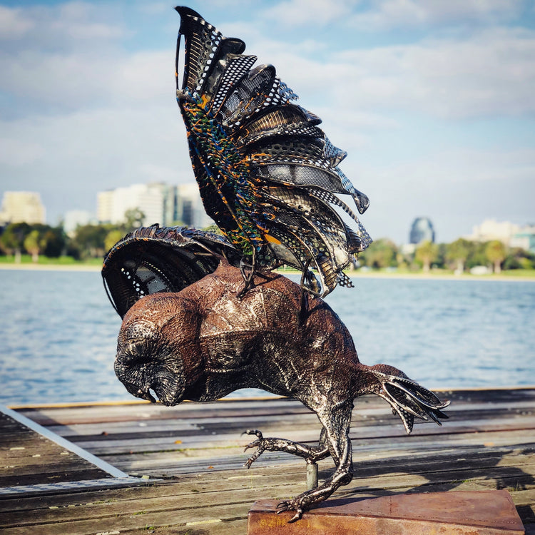 Large metal owl sculpture
