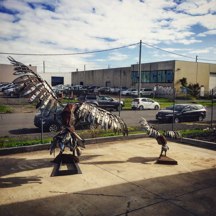 Large metal owl sculpture