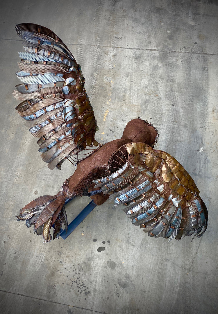 Large metal owl sculpture
