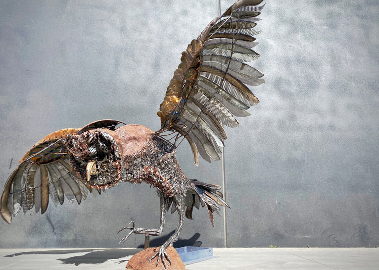 Large metal owl sculpture
